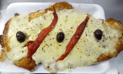 Suprema a la pizza con guarnición