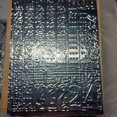 Chapita Al art placa nro 065