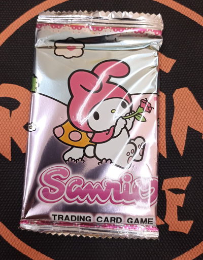 Sobre alternativo Sanrio TCG (10 cartas) 02 - Kitty Kuromi my melody