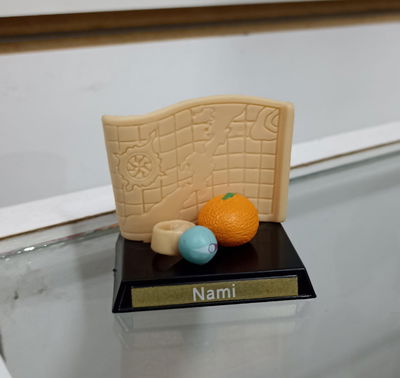 Nami reliquias gashapones 3-5cm Figura One Piece sin caja