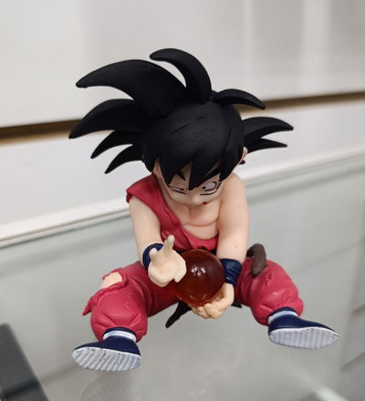 Goku Kid golpeado con esfera11cm Figura Dragon Ball sin caja