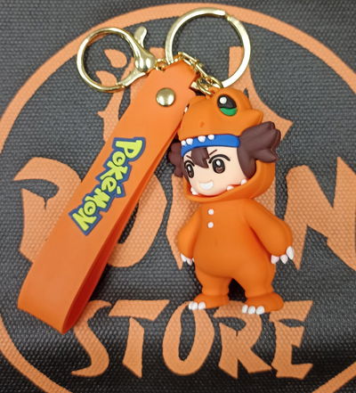 Tai Disfraz de Agumon Llavero de Goma Personaje Digimon