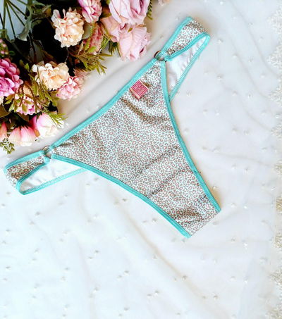 culottin cola less en lycra algodon print celeste y rosa con detalles de argollas