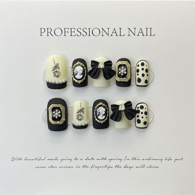 Uña press on con diseño de moño