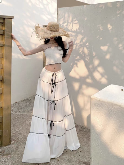 Conjunto de blusa +pollera larga color blanco con liston negro