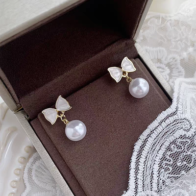 Aritos Coquette lazo y perla 