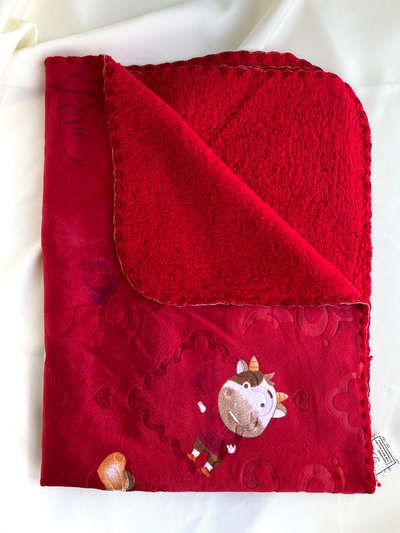 Manta de plush con corderito