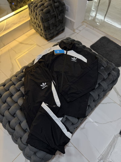 PROMO CONJUNTO ROMPEVIENTO ADIDAS
