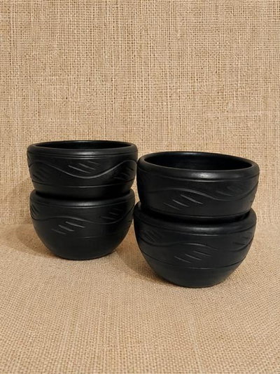 Sopera negra tallada