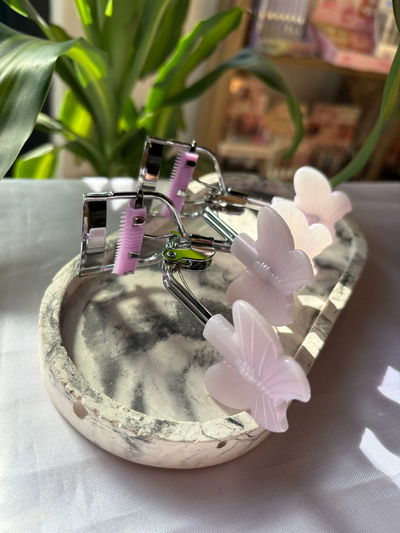 arqueador mariposa con cepillo