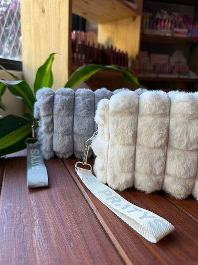 portacosméticos peluche 