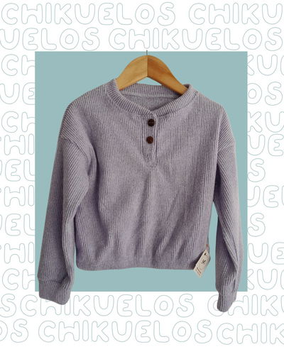 Buzo corto lila con botones
