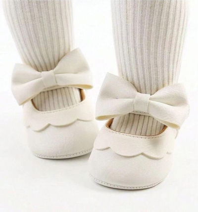 Bailarinas crema con moño no caminante 