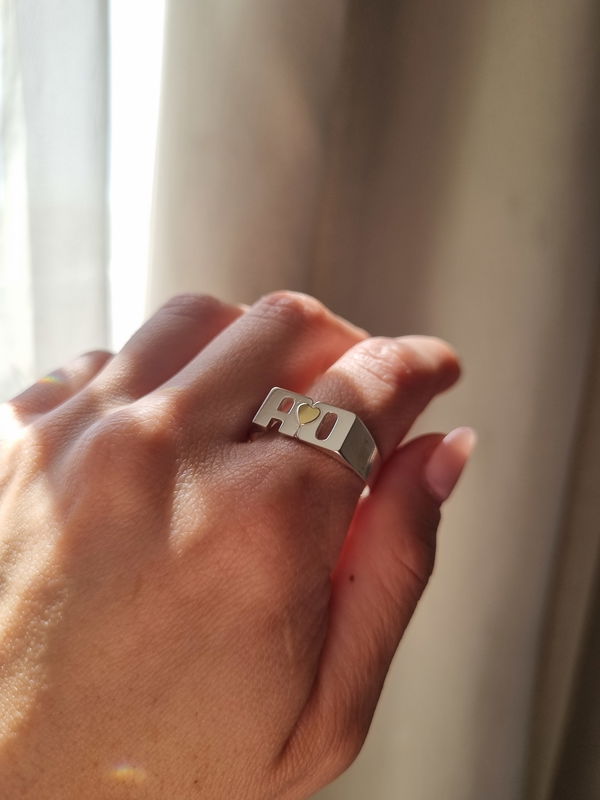 Doble inicial + Corazón