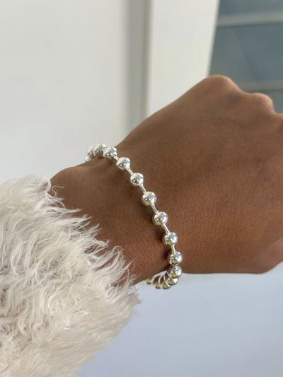 Pulsera met