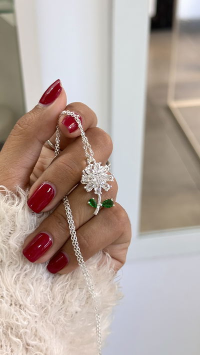 Collar flor giratorio 