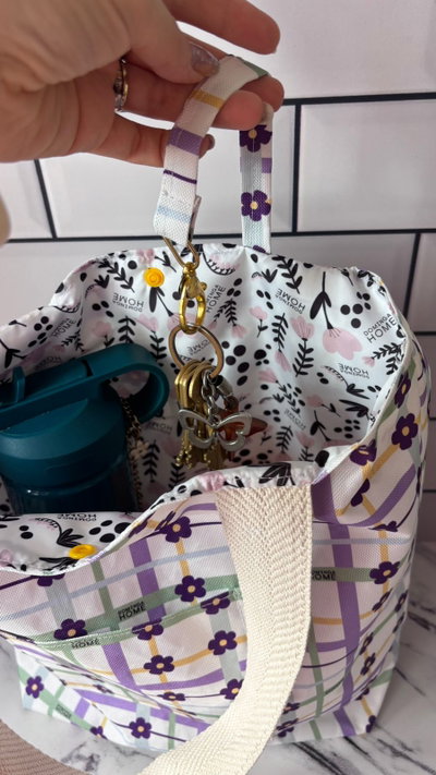BOLSO MATERO | Flor de cuadrille lila.