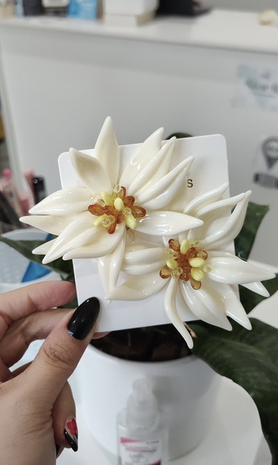 AROS FLORES CON CENTRO CUENTAS OVALADAS