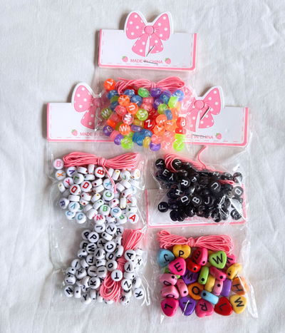 Charms x50 o letras x300