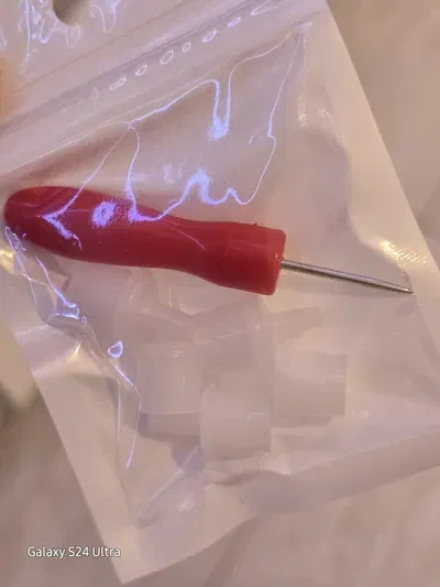 Aguja y repuestos de tapones para adhesivo