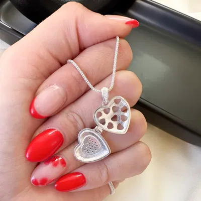 RELICARIO CORAZÓN CON CUBIC