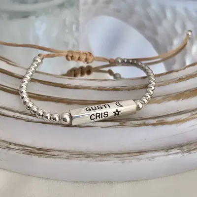 PULSERA CON BARRITA MACIZA HILO DE SEDA