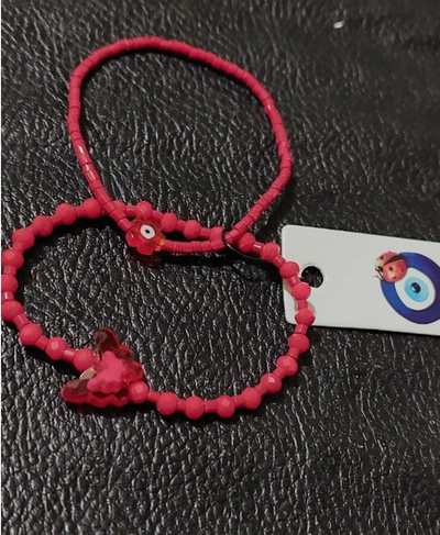 Pulsera roja mariposa 