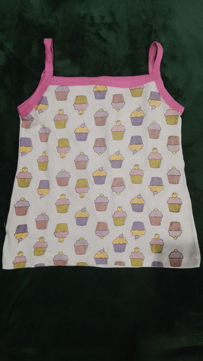 Musculosa Muffins con tiritas niña