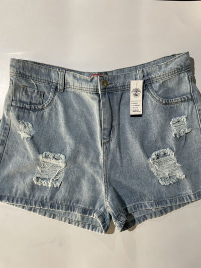 Short de jean con rasgaduras