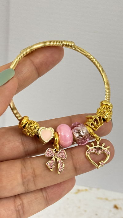 Pulsera Charms Moño Rosa