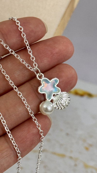 Conjunto Ostra y Estrella Celeste AB