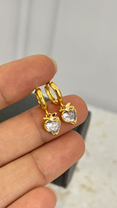 Aros Corazon Con Moño Transparente Dorado