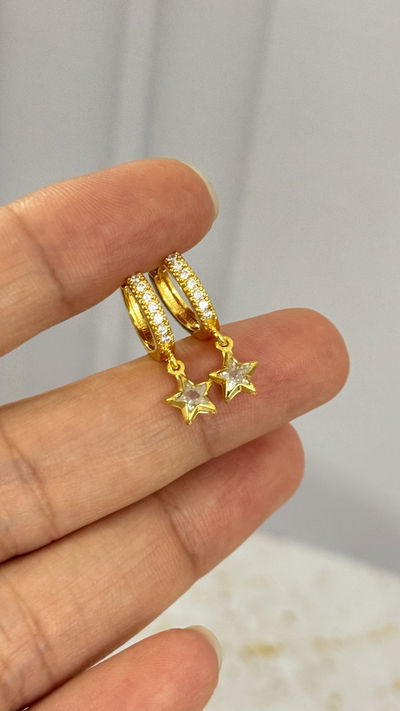 Aros Estrella Transparente Dorado