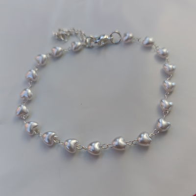 Pulsera corazones perlados