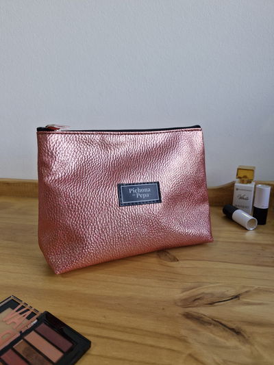 Porta cosméticos coral metalizado