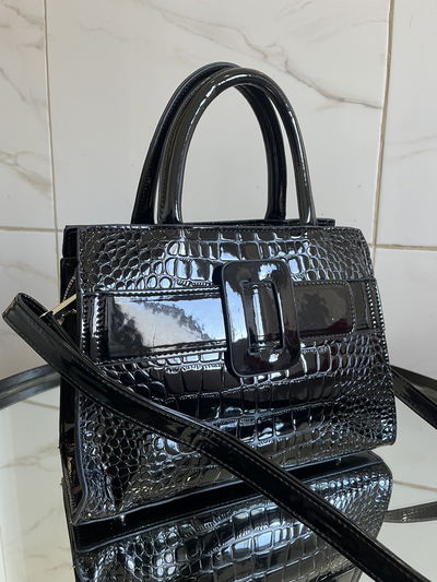 CARTERA CHAROL