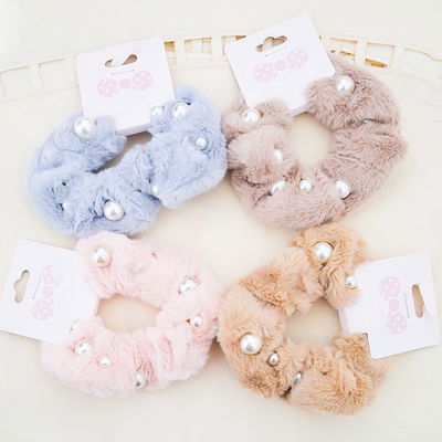 Colitas de peluche con perlas 