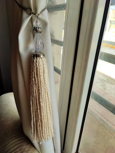 Colgante/agarra cortinas "SUR"
