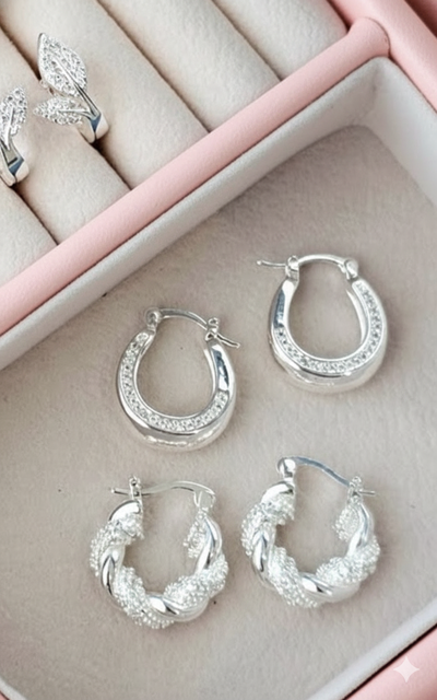 argollas hamy ovalada con una tira de piedras