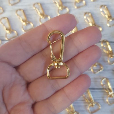 Mosquetón metálico Dorado - 18mm x 38mm x un.