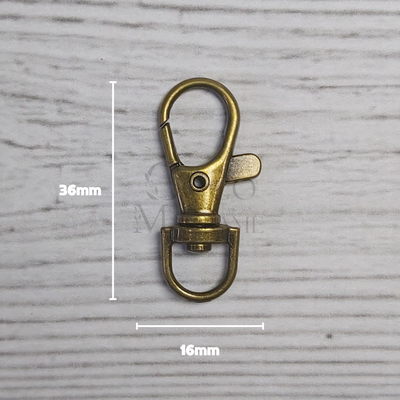 Mosquetón metálico bronce 16mm x 36mm x un.