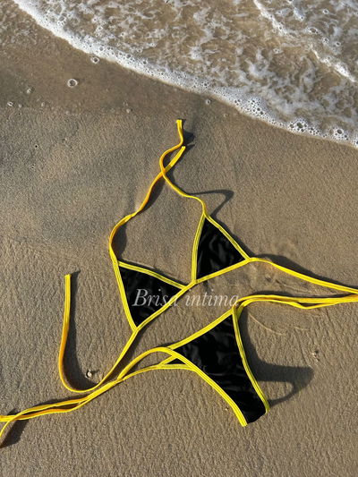 BIKINI NEGRA BORDE AMARILLO atar