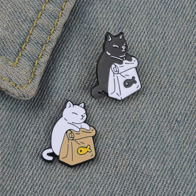 Pin gato con bolsa