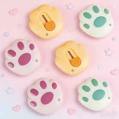Mini cutter huellita gato retráctil