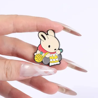 Pin conejo tejedor