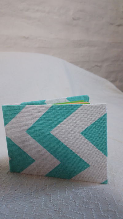 Anotador chico verde