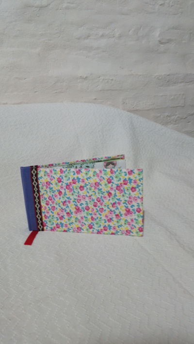 Anotador flores con elástico