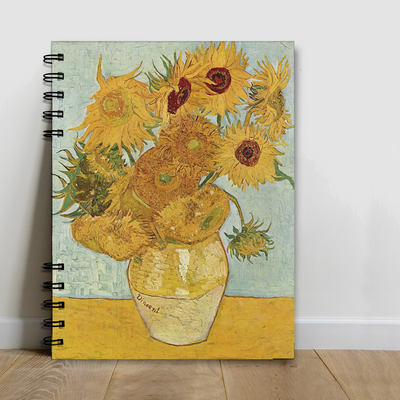 CUADERNO A5 ESPIRALADO 80 HOJAS LISAS JARRO CON DOCE GIRASOLES A LA PUPE