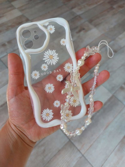 FLORES BLANCAS CON STRAP IP 15 PROMAX