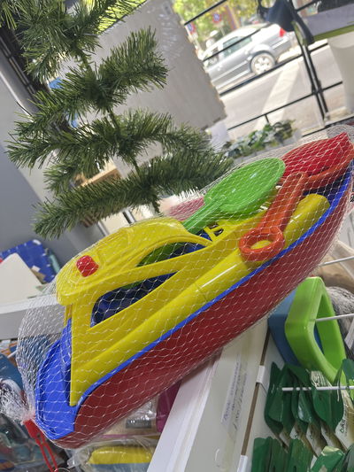 Lancha juego de playa con palitas